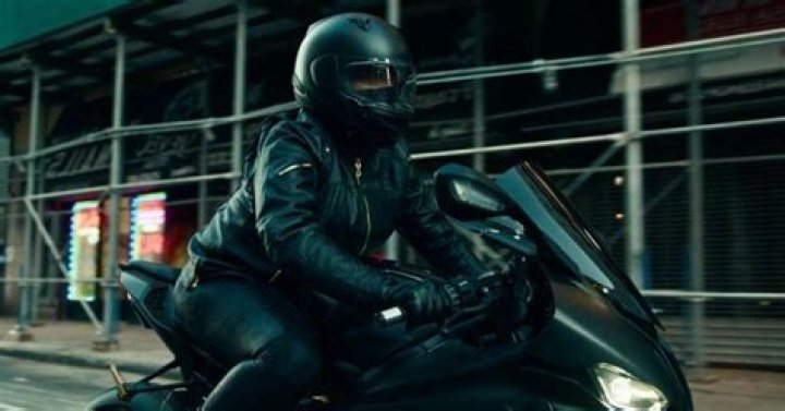 Does Queen Latifah ride the motorcycle in the equalizer?