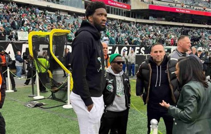 Philadelphia 76ers’ PF Joel Embiid makes Kevin Hart look like a small child with his dad in Eagles vs 49ers NFC Championship game